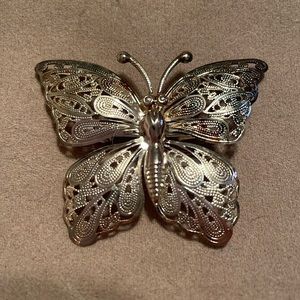 Vintage silver coloured metal butterfly